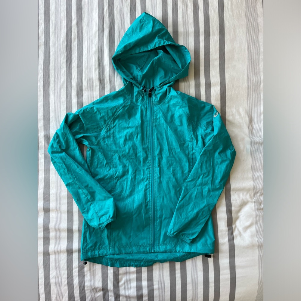 turquoise rain jacket